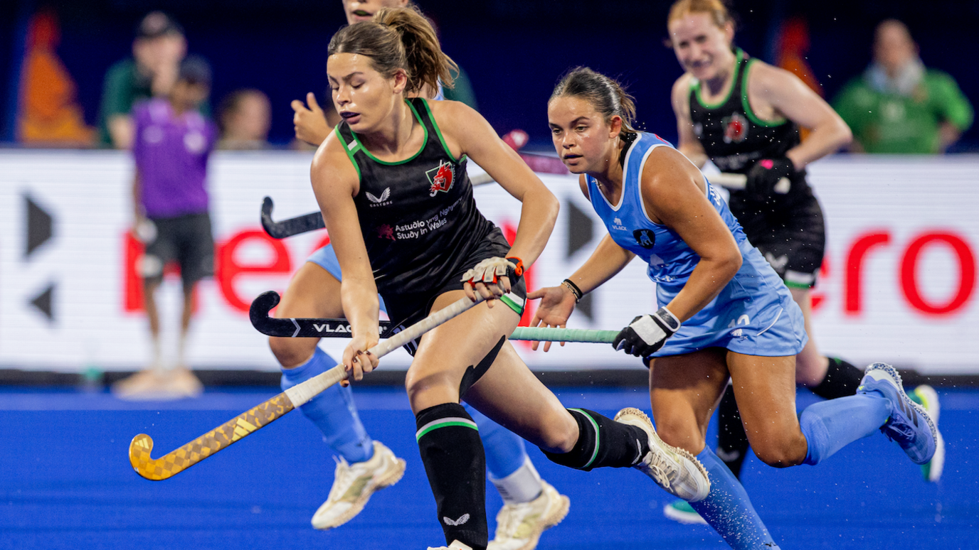 Betsan Thomas runs with the ball