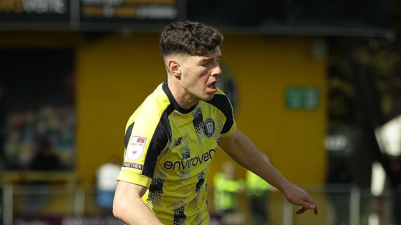 Ellis Taylor playing in a match for Harrogate