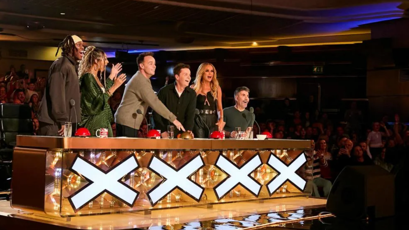 Ant and Dec, KSI, Alesha Dixon, Amanda Holden, and Simon Cowell press the golden buzzer together