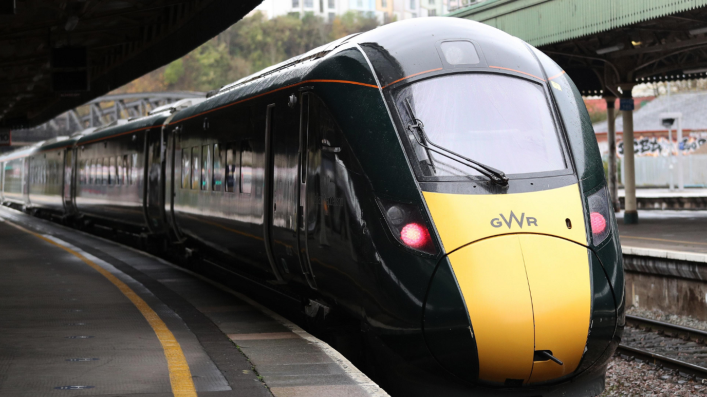 An image of a GWR train pulling into a station 