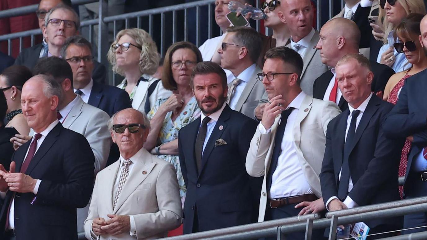 Sir David Beckham and Paul Scholes are among those from the Class of '92 in the stands supporting Saford City