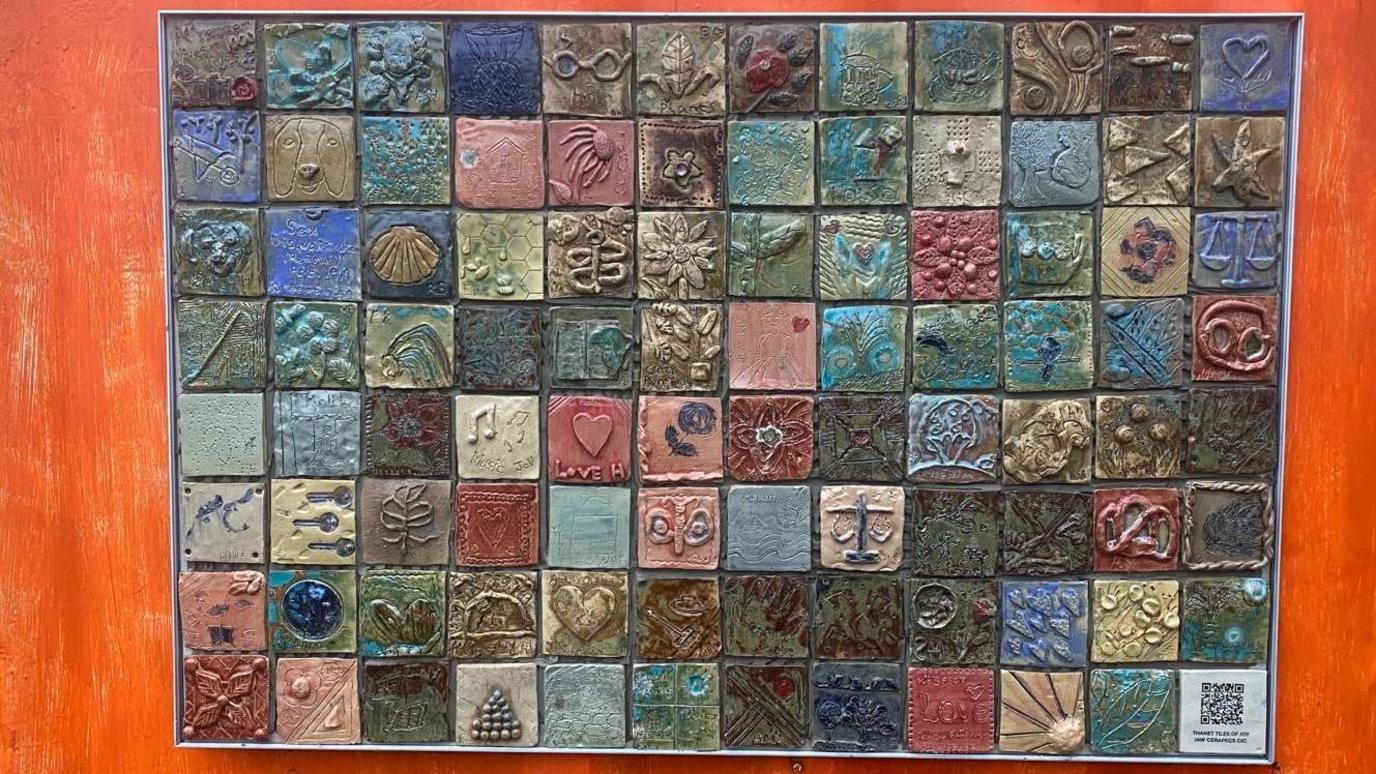 A collection of 96 tiles is on display at Windmill Community Gardens in Margate - each has been made by a member of the community on the them of happiness