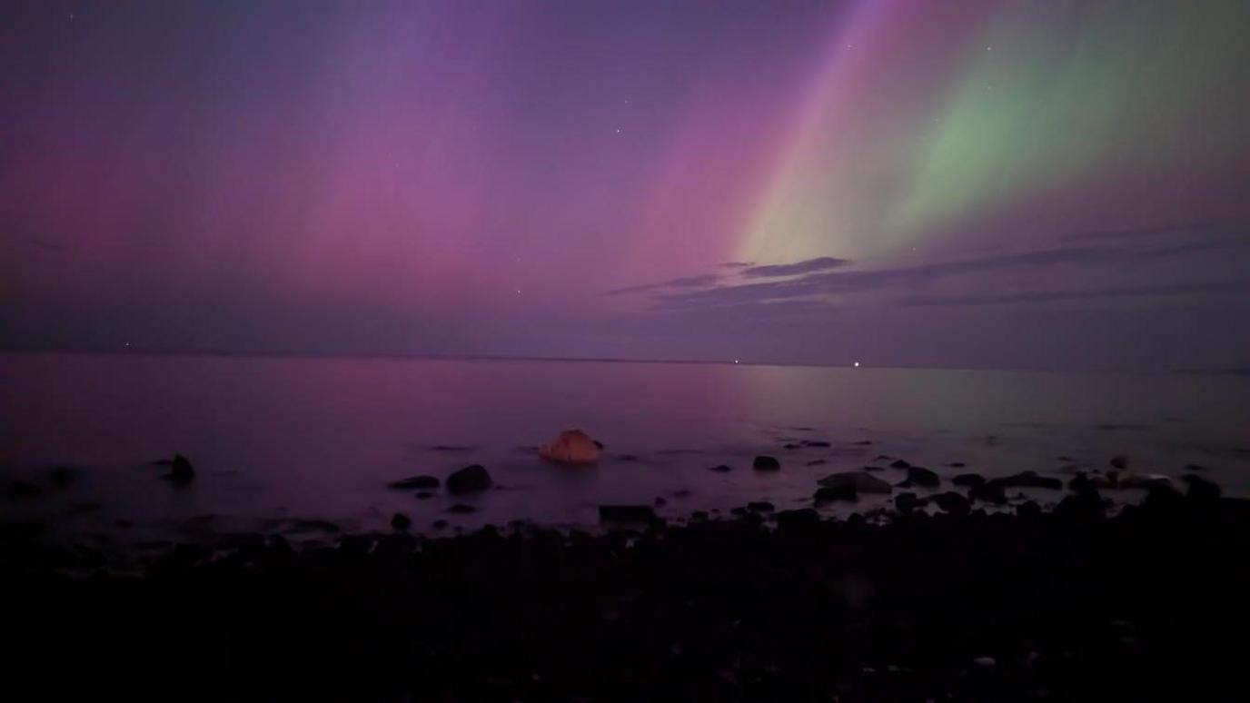 Northern Lights reflecting off the sea