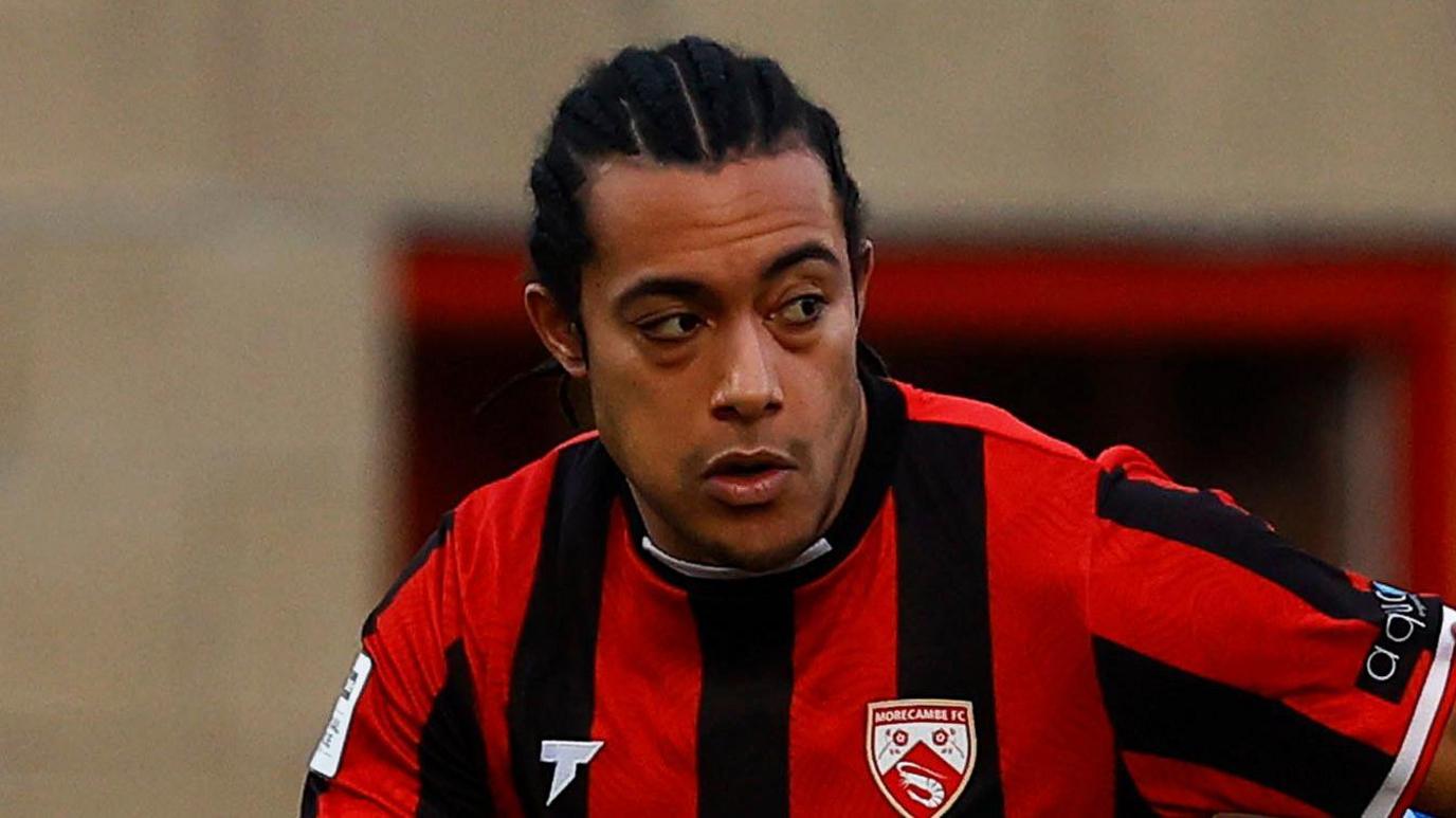 Miguel Azeez in action for Morecambe