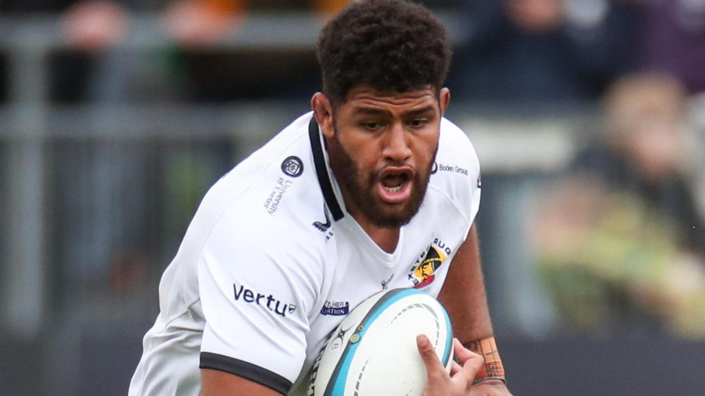 Rusi Tuima brings the ball forward for Exeter