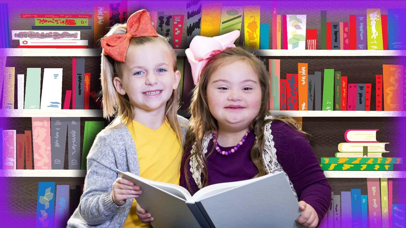 Two-girls-with-a-book-for-World-Book-Day.