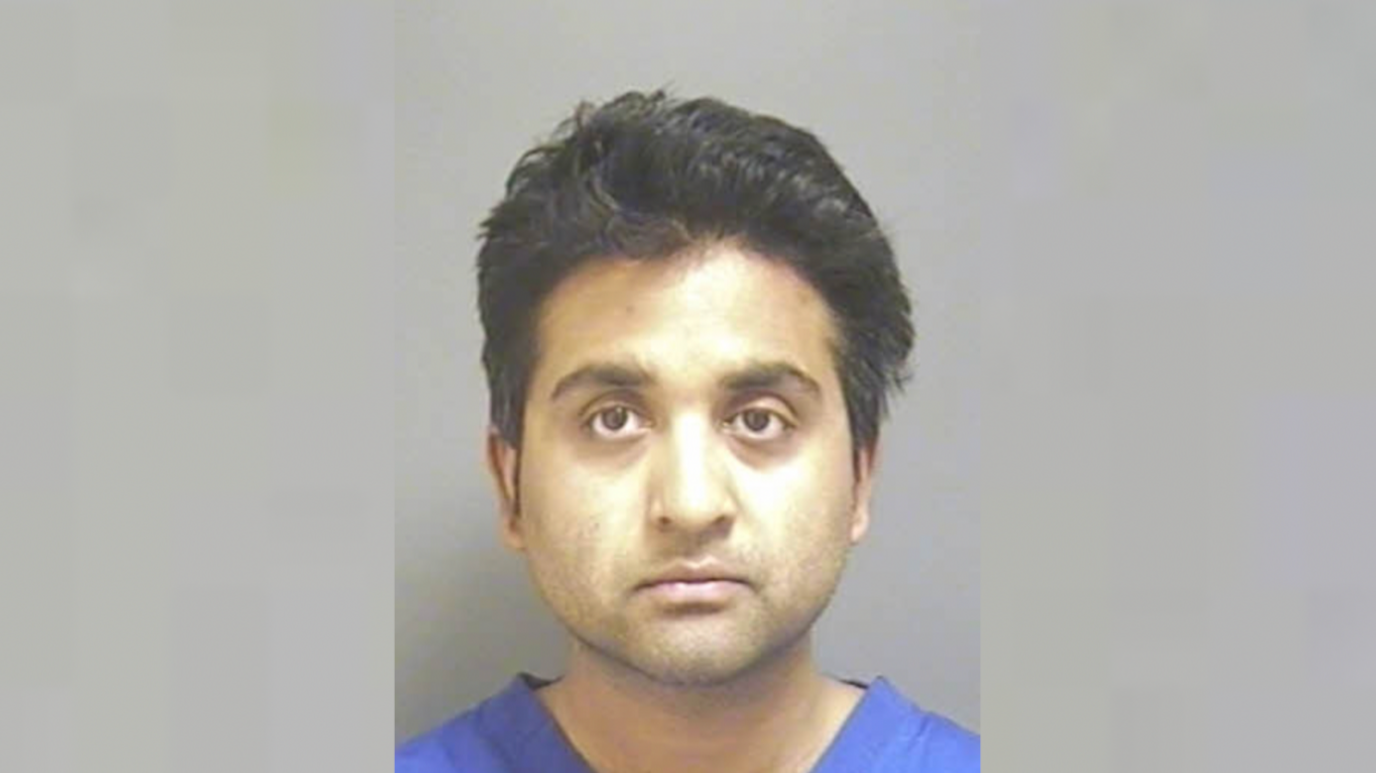 Police custody shot of Salil Korambayil