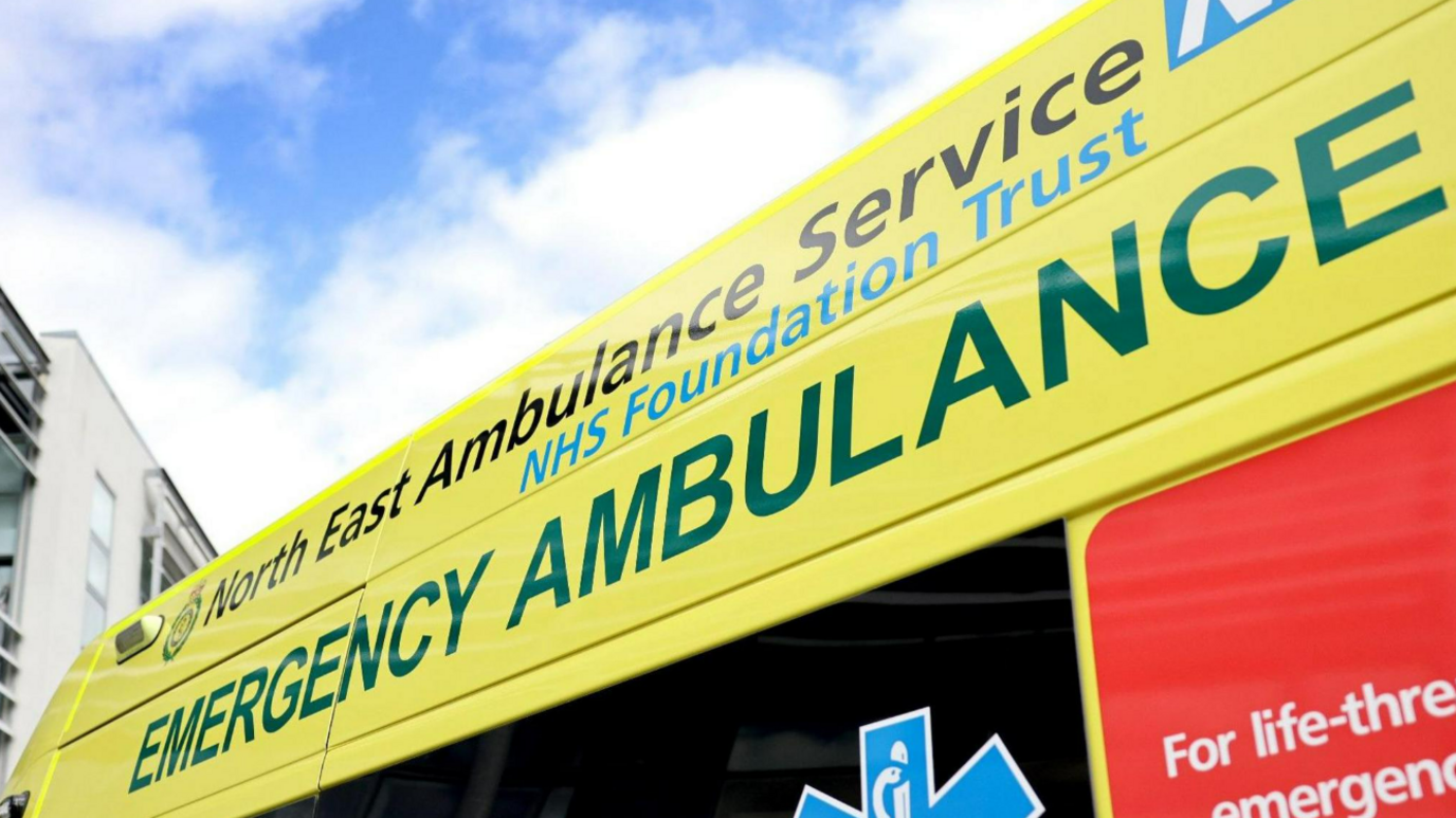 Close up of the branding on a North East Ambulance Service ambulance