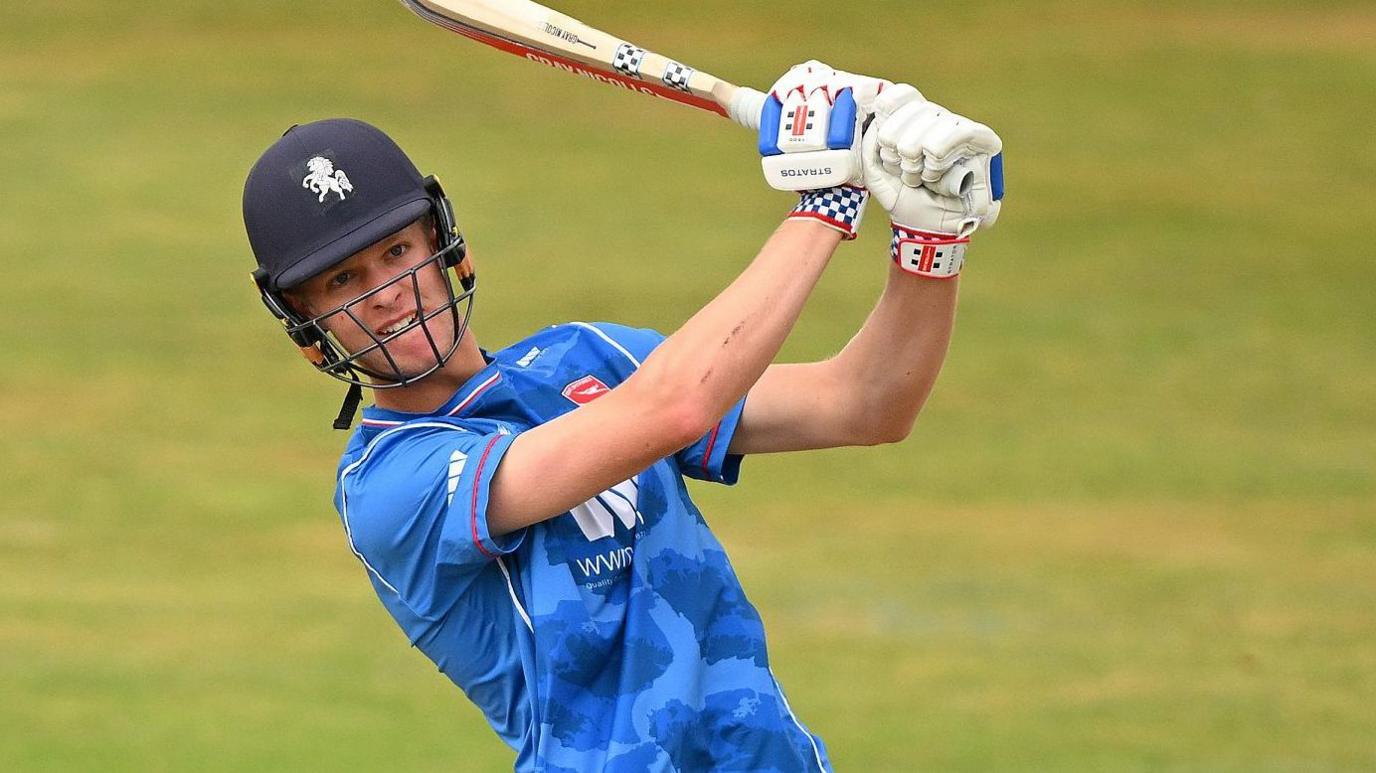 Kent's Ben Dawkins hit s a six against Northants