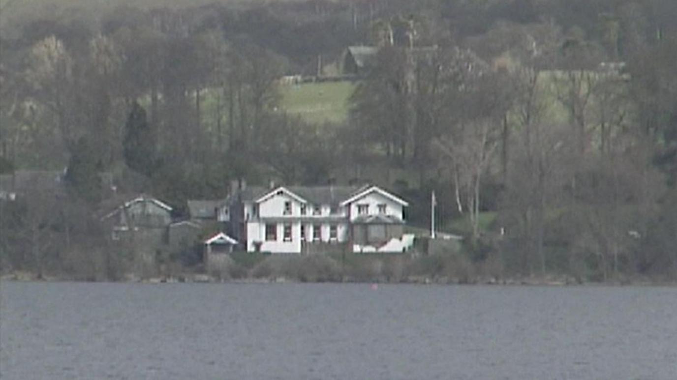 A screenshot taken from a archive footage. A general view of Sharrow Bay pictured from Ullswater.