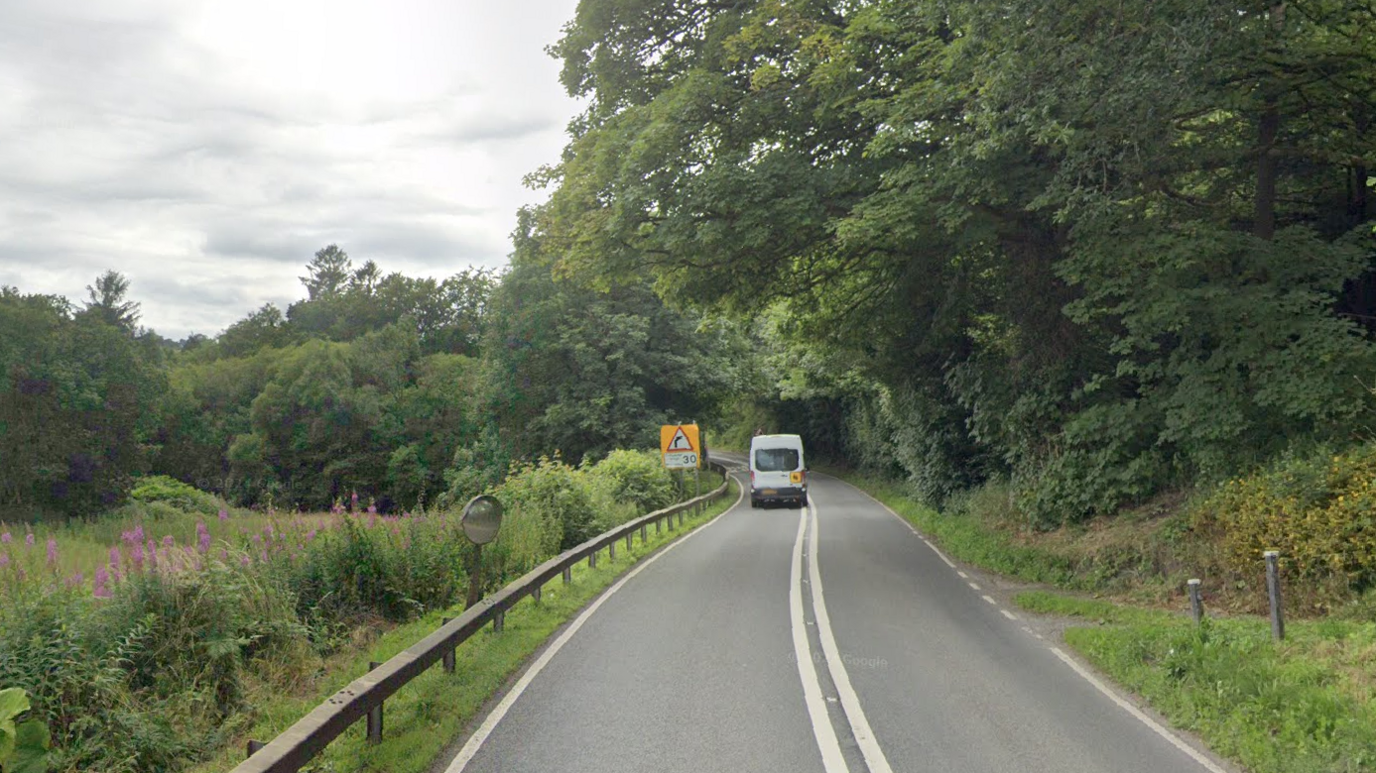 The A40 via google streetview. Single carriageway lined with bushes