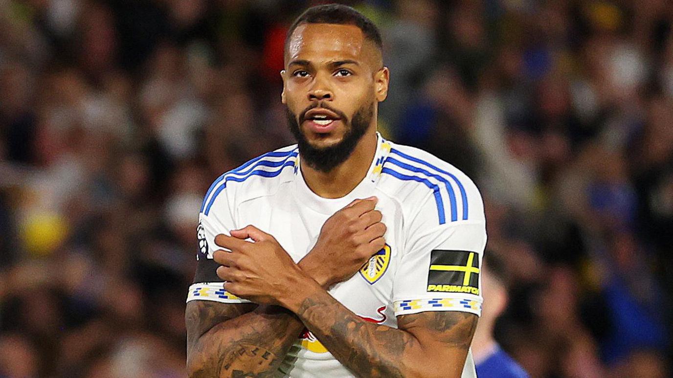 Lukas Nmecha celebrates after giving Leeds United the lead from the spot against Everton at Elland Road