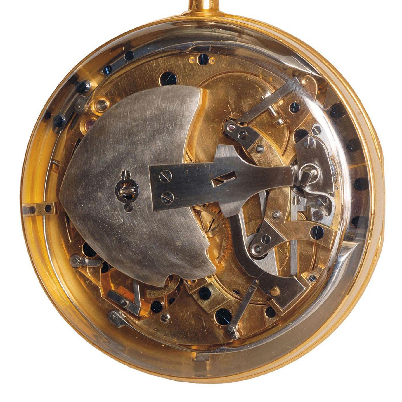 A view of the back of the watch, showing tiny platinum and gold parts underneath 