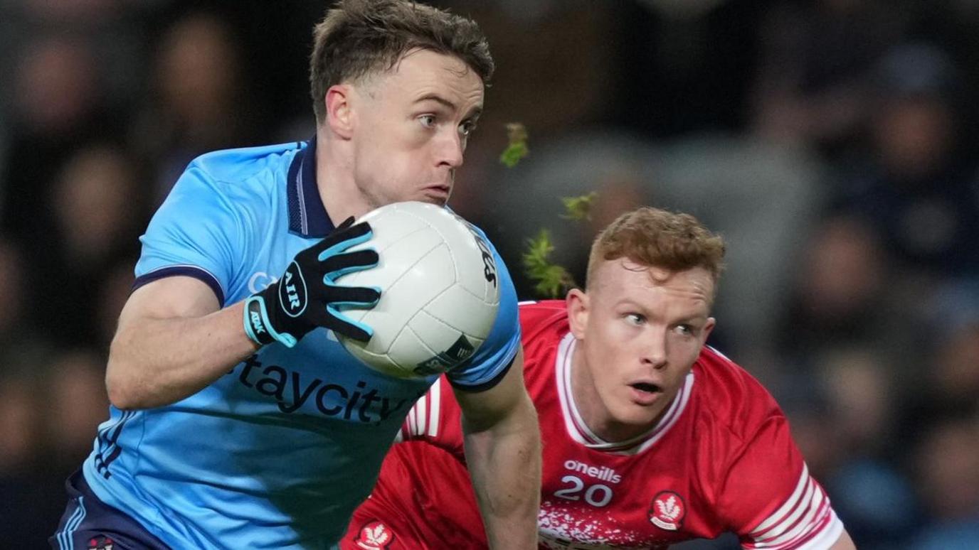 Dublin's Niall O'Callaghan is tracked by Martin Bradley in Saturday night's game