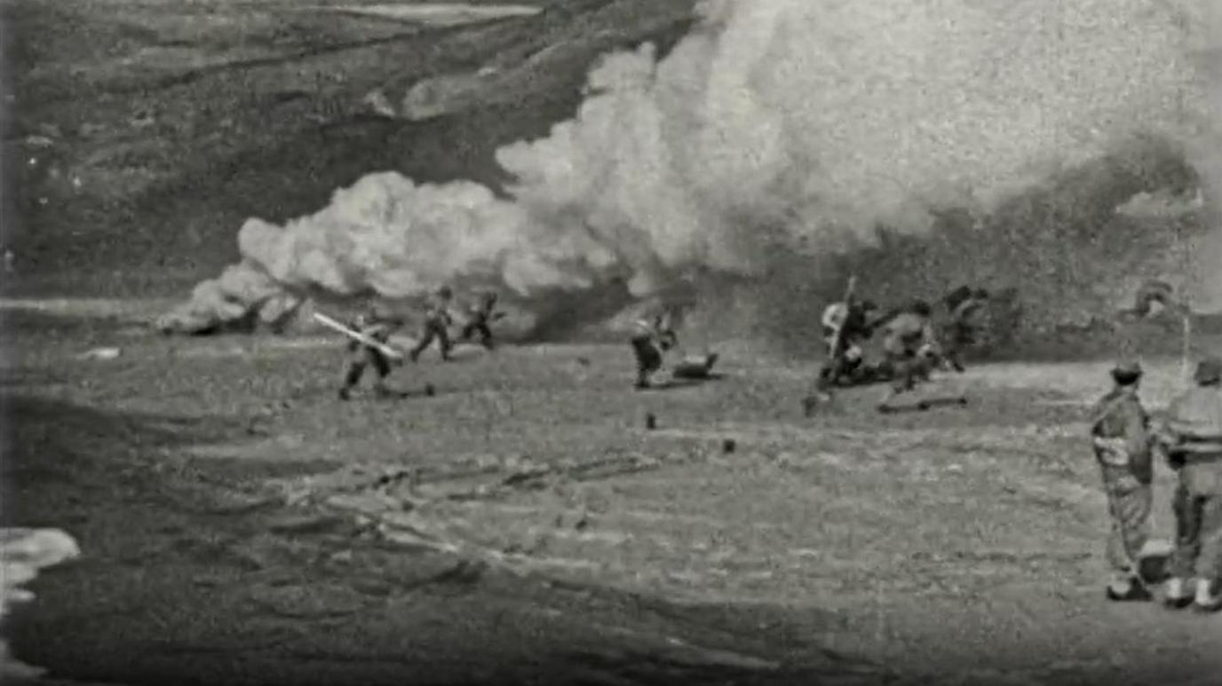 Archive shot of troops on the beach. 
