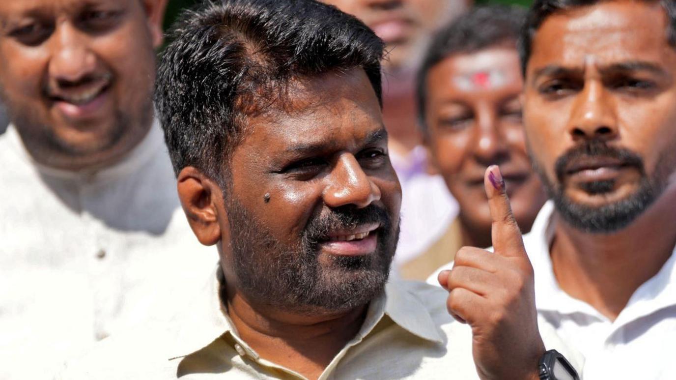 President Anura Kumara Dissanayake talking to his supporters after casting his vote