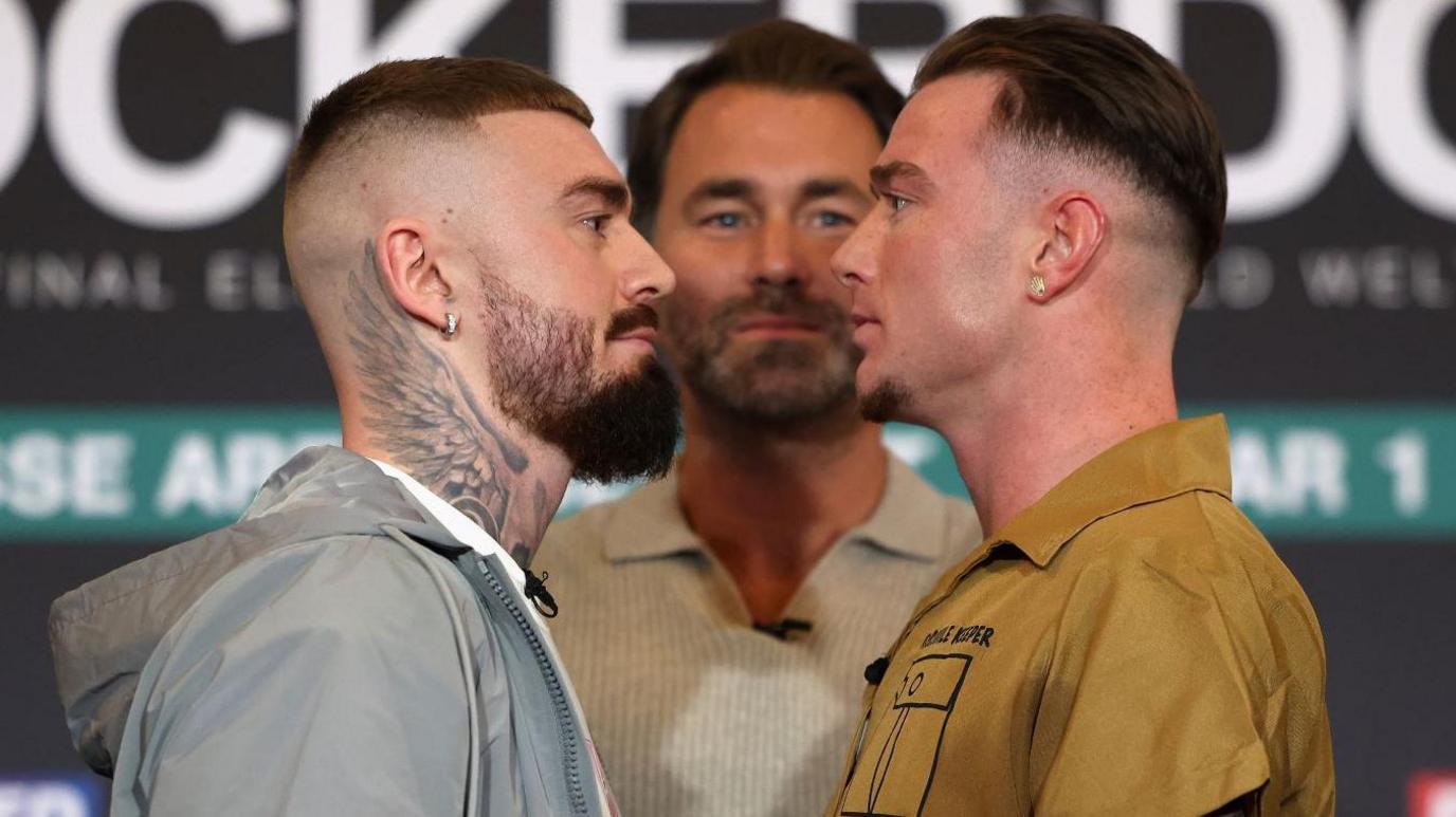 Unbeaten welterweights Lewis Crocker (left) and Paddy Donovan (right) with promoter Eddie Hearn (centre)