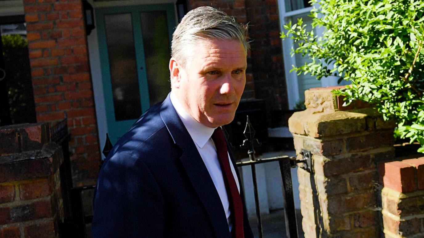 Starmer leaving his house on Friday morning