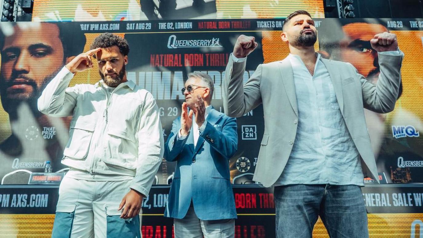 Moses Itauma and Filip Hrgovic pose for the cameras, with promoter Frank Warren between them