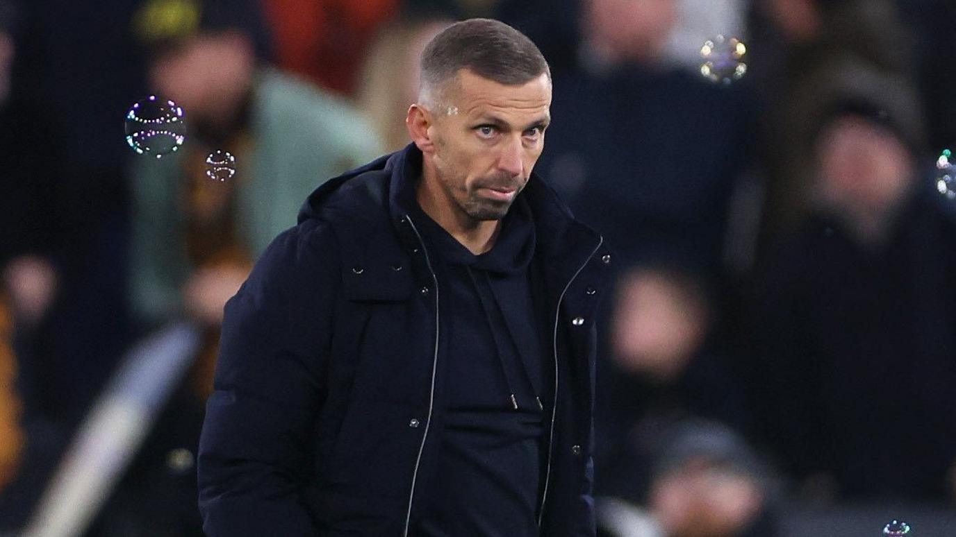 Gary O'Neil walks across the West Ham pitch after defeat at the London Stadium on Monday.