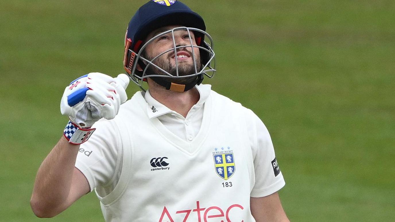 Ollie Robinson celebrates scoring century