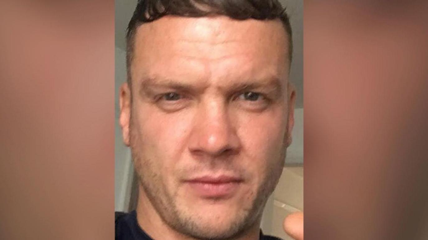 A selfie of Donovan Kitching - a man with dark hair and stubble.