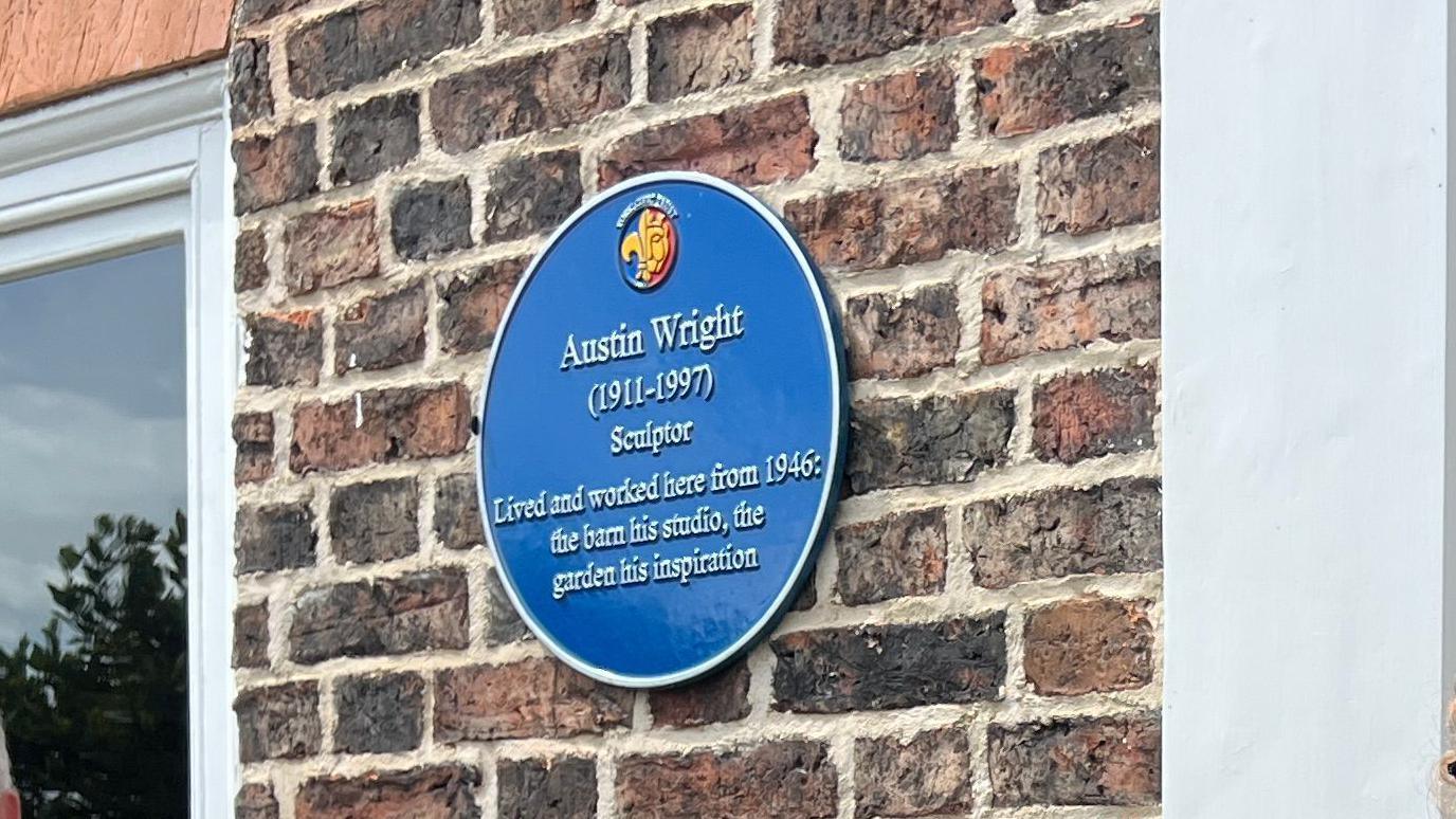 The plaque honouring Austin Wright