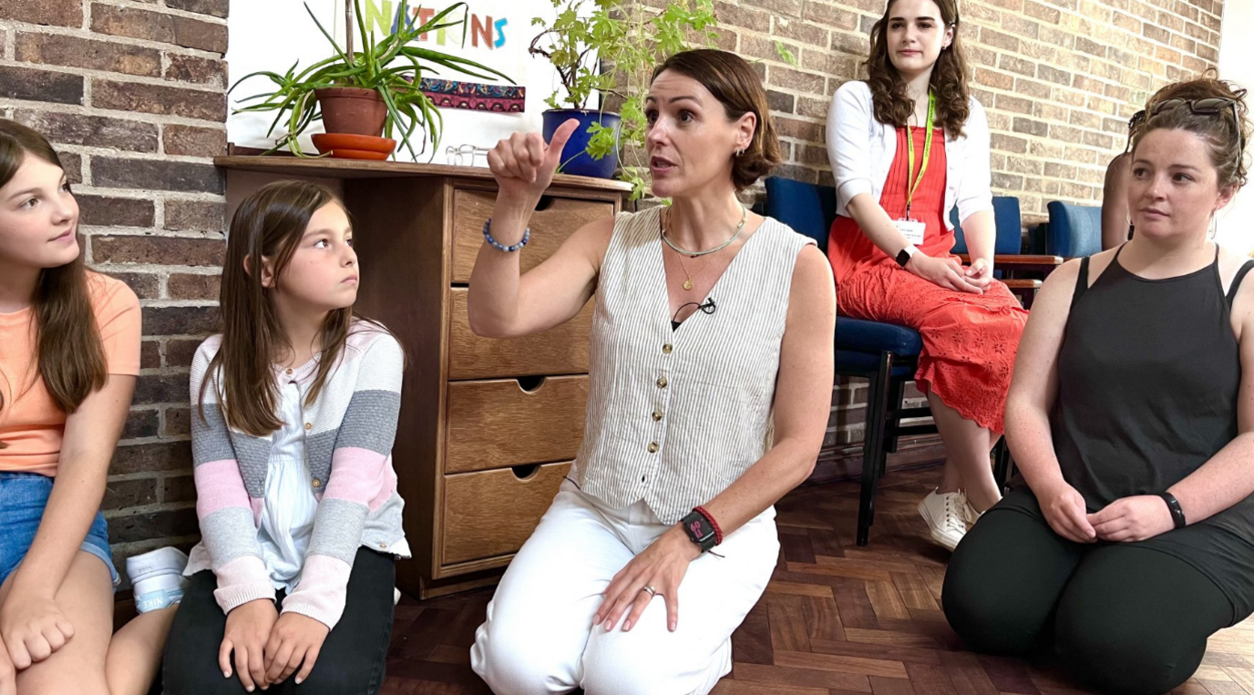 Suranne Jones and unnamed children and teenagers at her drama workshop