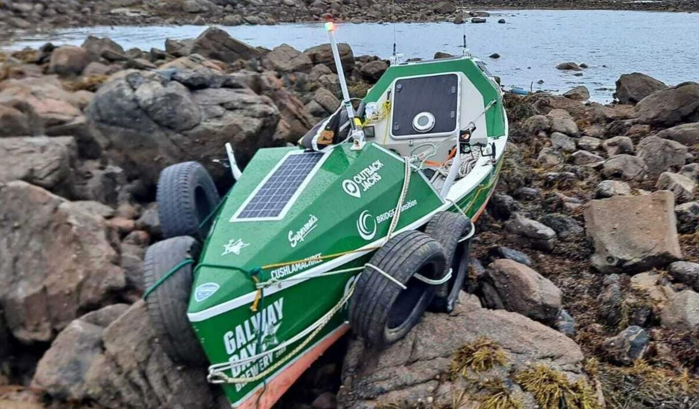 The row boat on the rocks off the coast of Galway