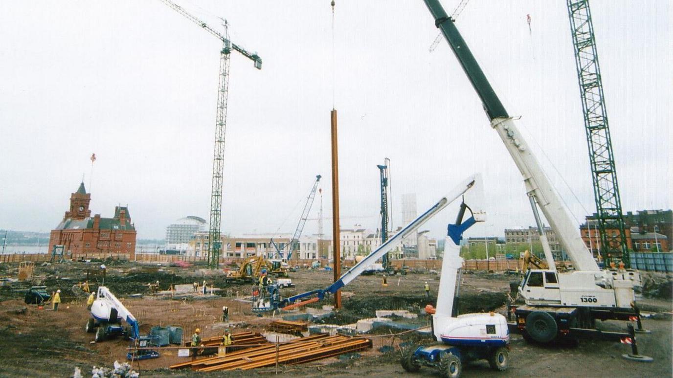 Builders break ground on the Wales Millennium Centre, placing the first steel strut into the ground.