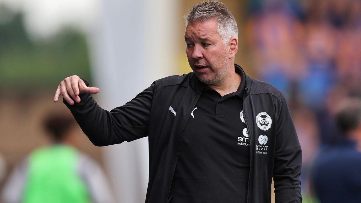 Darren Ferguson on the touchline during a game against Shrewsbury Town