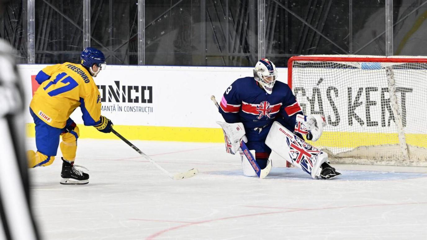 Ben Bowns makes a save for Great Britain against Ukraine