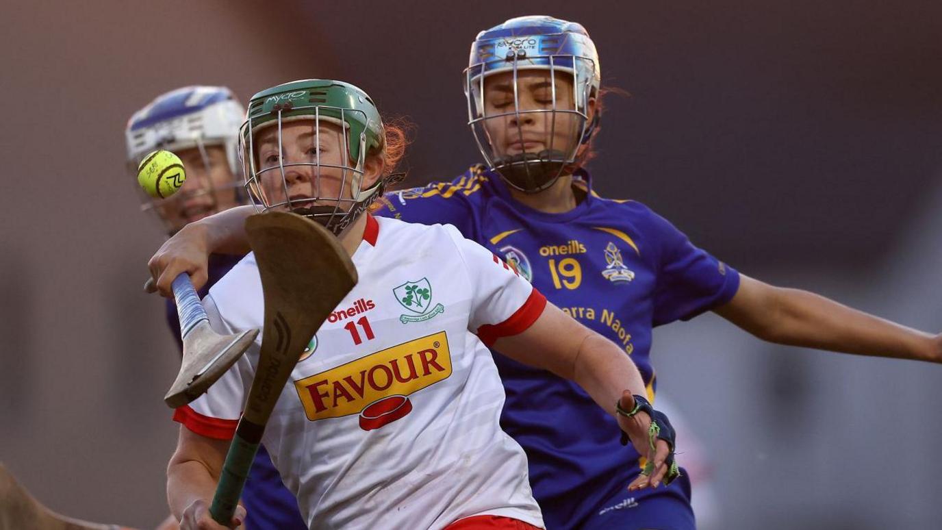 Loughgiel's Roisin McCormick is challenged by Liz O'Donovan