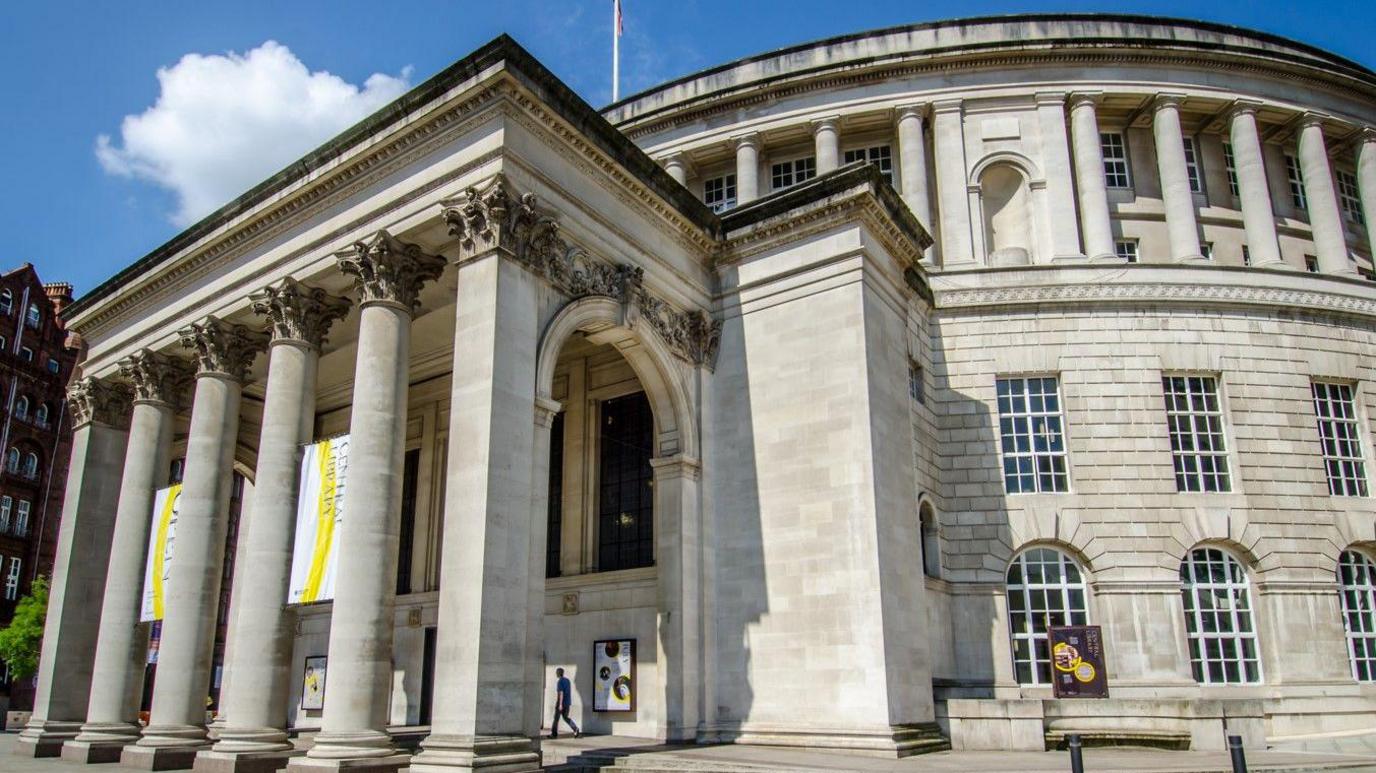 Exterior of Manchester Central Library on a sunny day 