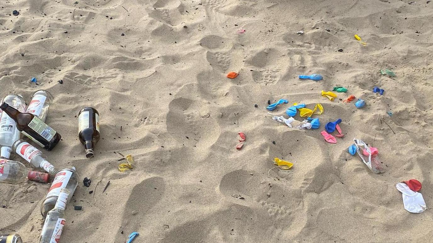 Empty bottles of alcohol and deflated balloons were left on King Edwards Bay, Tynemouth