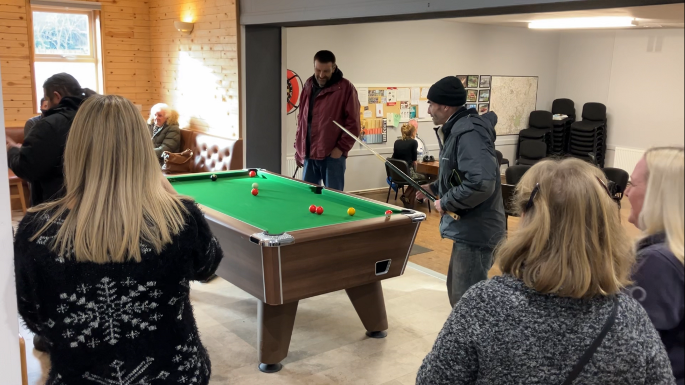 Volunteers and users at Warm Welcome's weekly lunch session