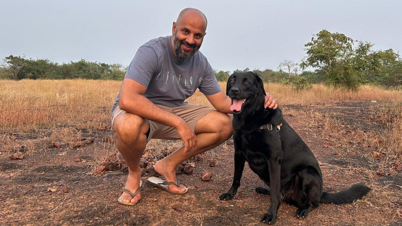 Saurabh Bhasin, who lived in Delhi, moved to the coastal state of Goa after his daughter was diagnosed with asthma, seen with his dog.