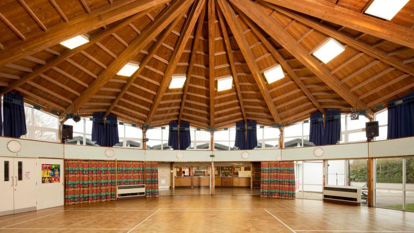 School hall with timber dodecagon ceiling