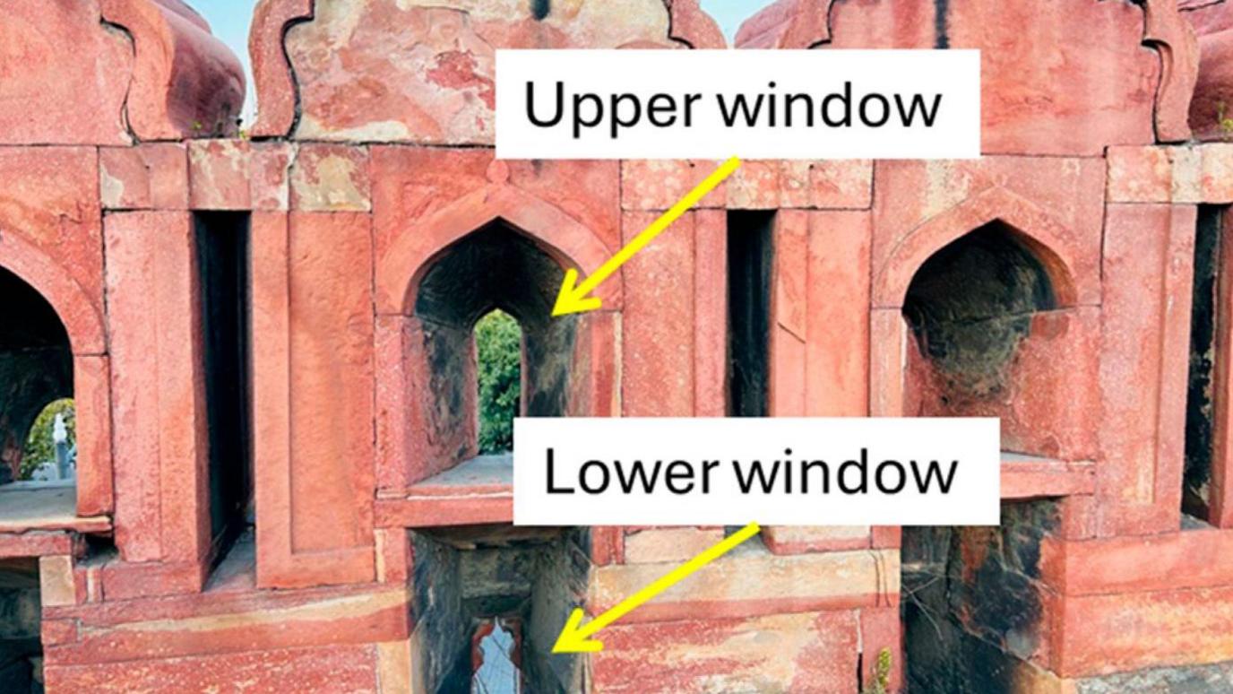 Black crusts seen on the upper and lower windows of Red Fort, New Delhi.