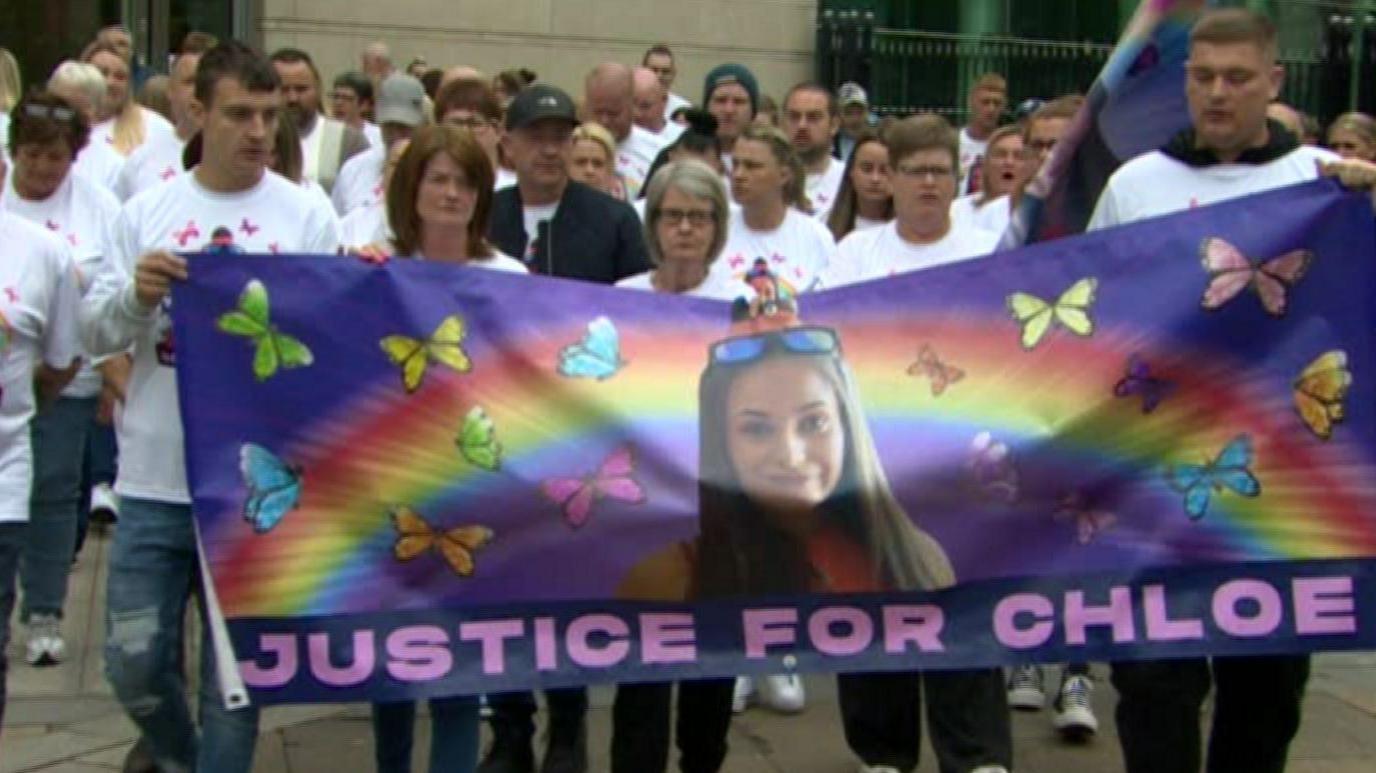 A group of supporters outside Belfast Crown Court