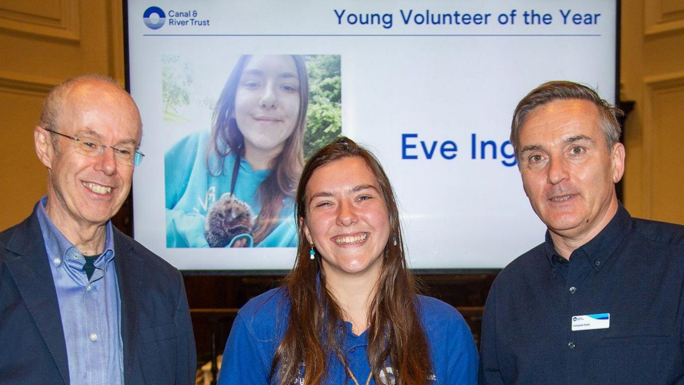 Marsh Charitable Trust ambassador Mike Heyworth, volunteer Eve Ingle and chief executive of the Canal and River Trust Campbell Robb pose at an awards ceremony