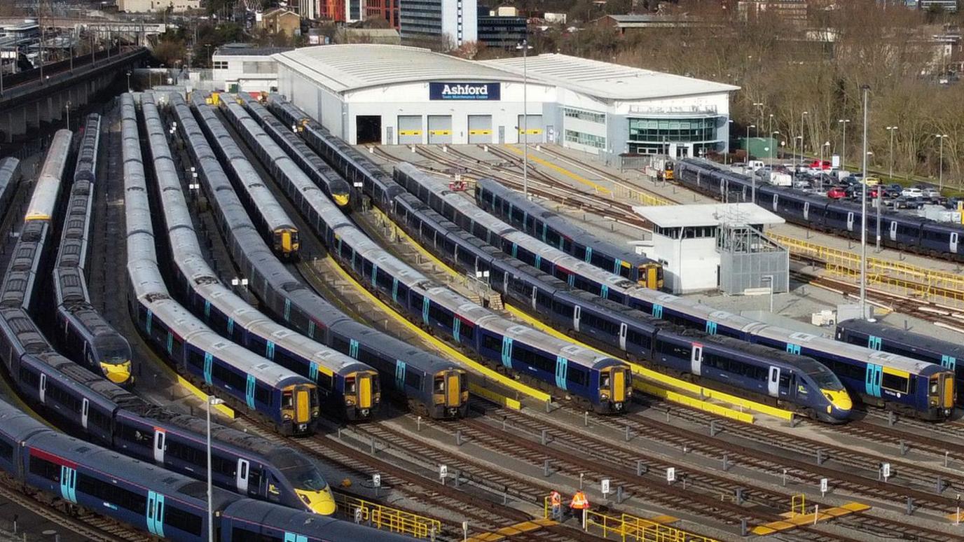 Southeastern trains sit in a depot at Ashford on a previous strike day