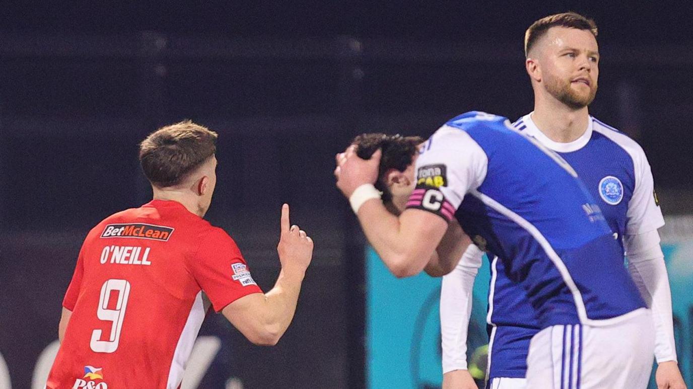 Paul O'Neill celebrates scoring the opener for Larne against Glenavon