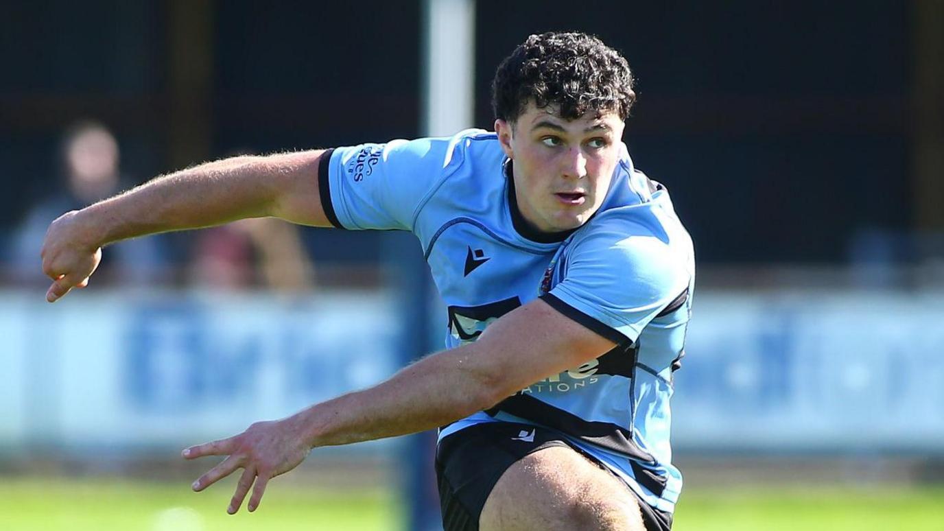 Harri Wilde kicks at goal for Cardiff RFC