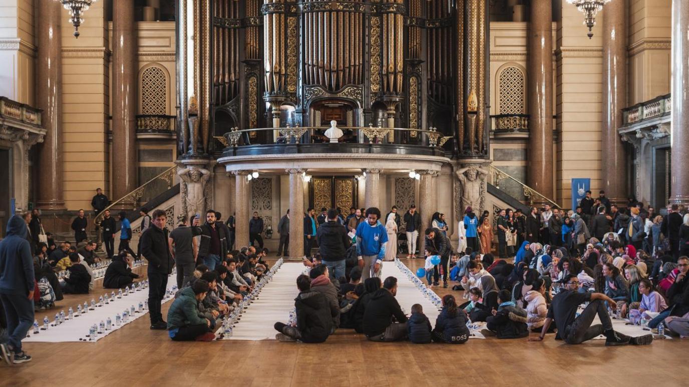 People gathered for iftar meal in St George's Hall