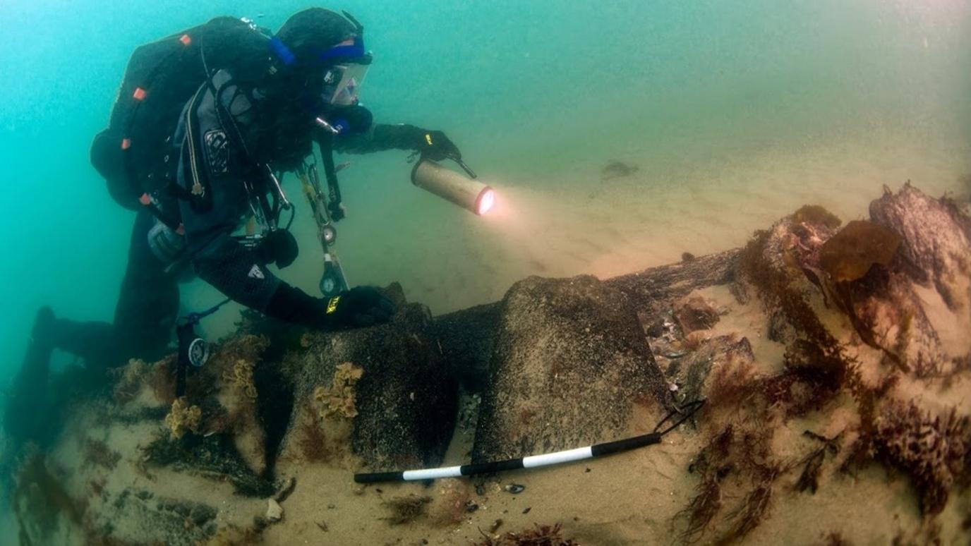 A diver surveys the HMS Invincible, a Protected Wreck Site at Horse and Dean Sand