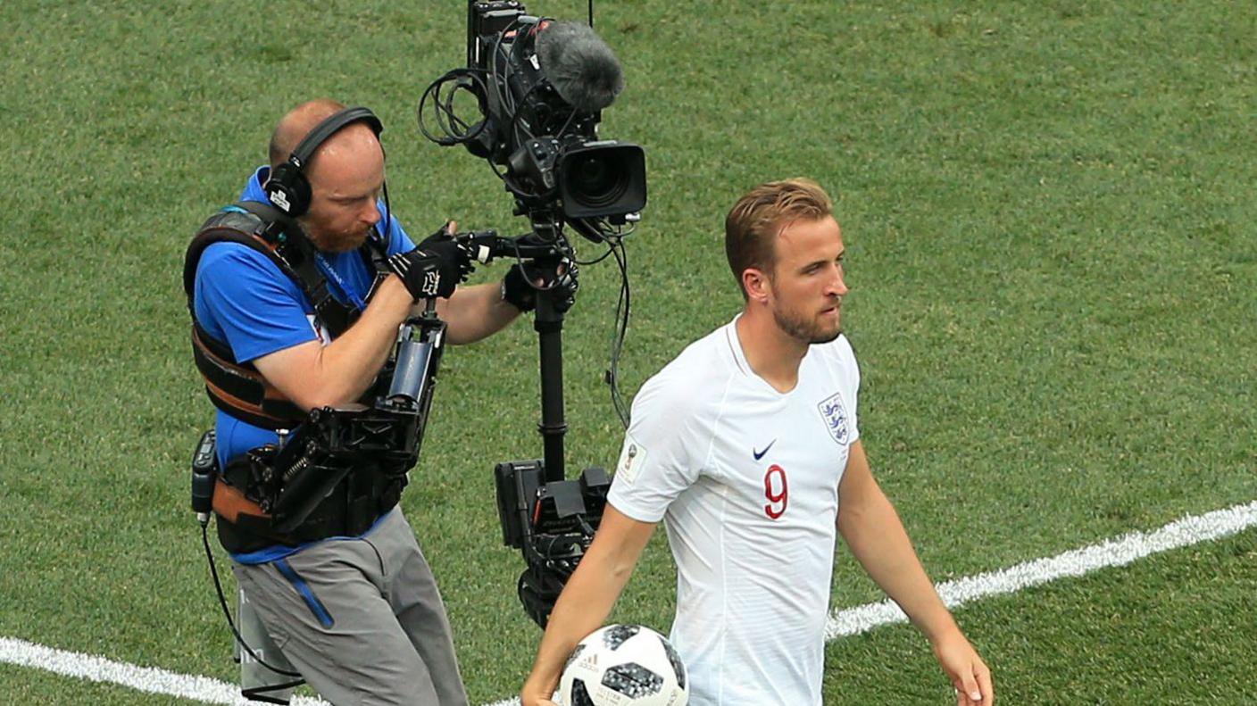Harry Kane is filmed by a cameraman at the 2018 World Cup