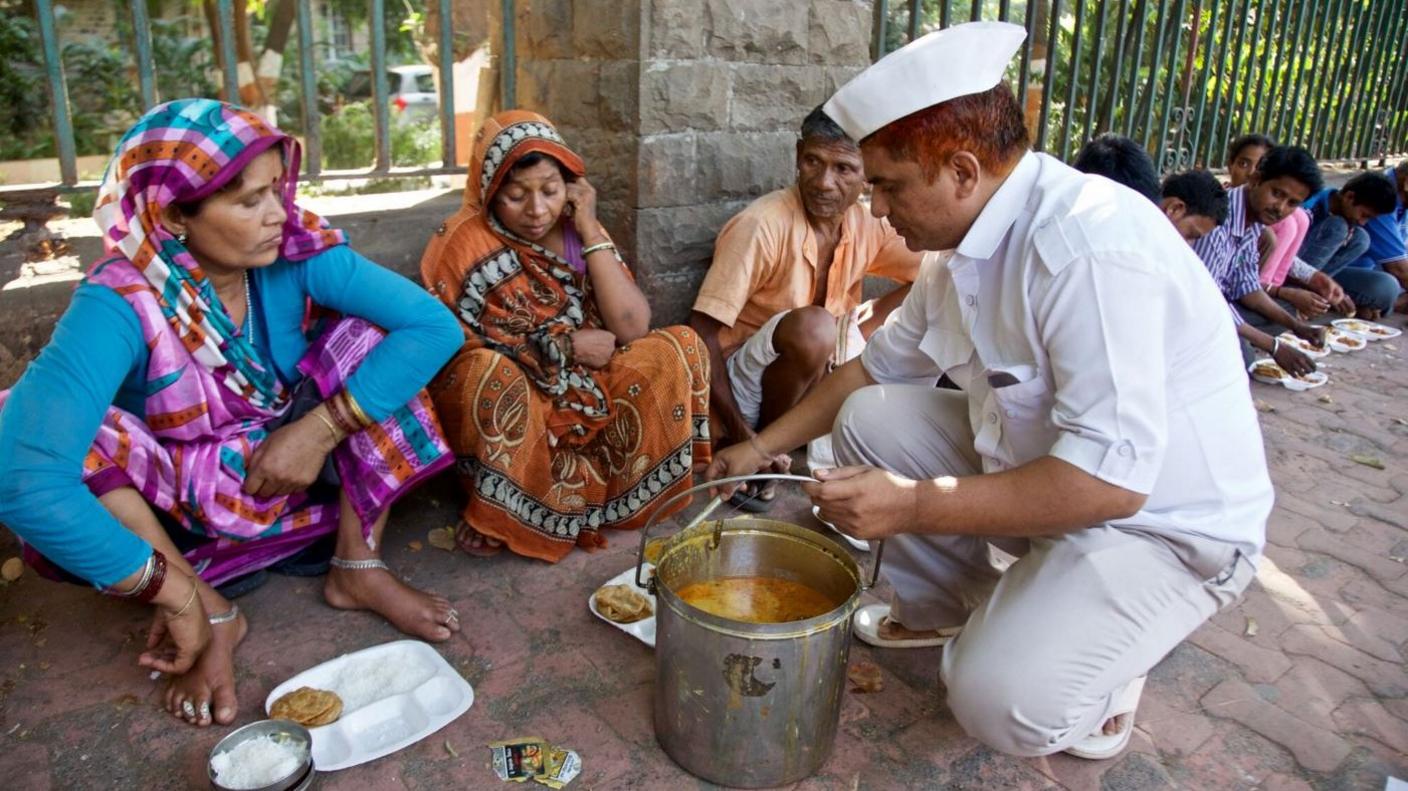 Dabawalla handing out food