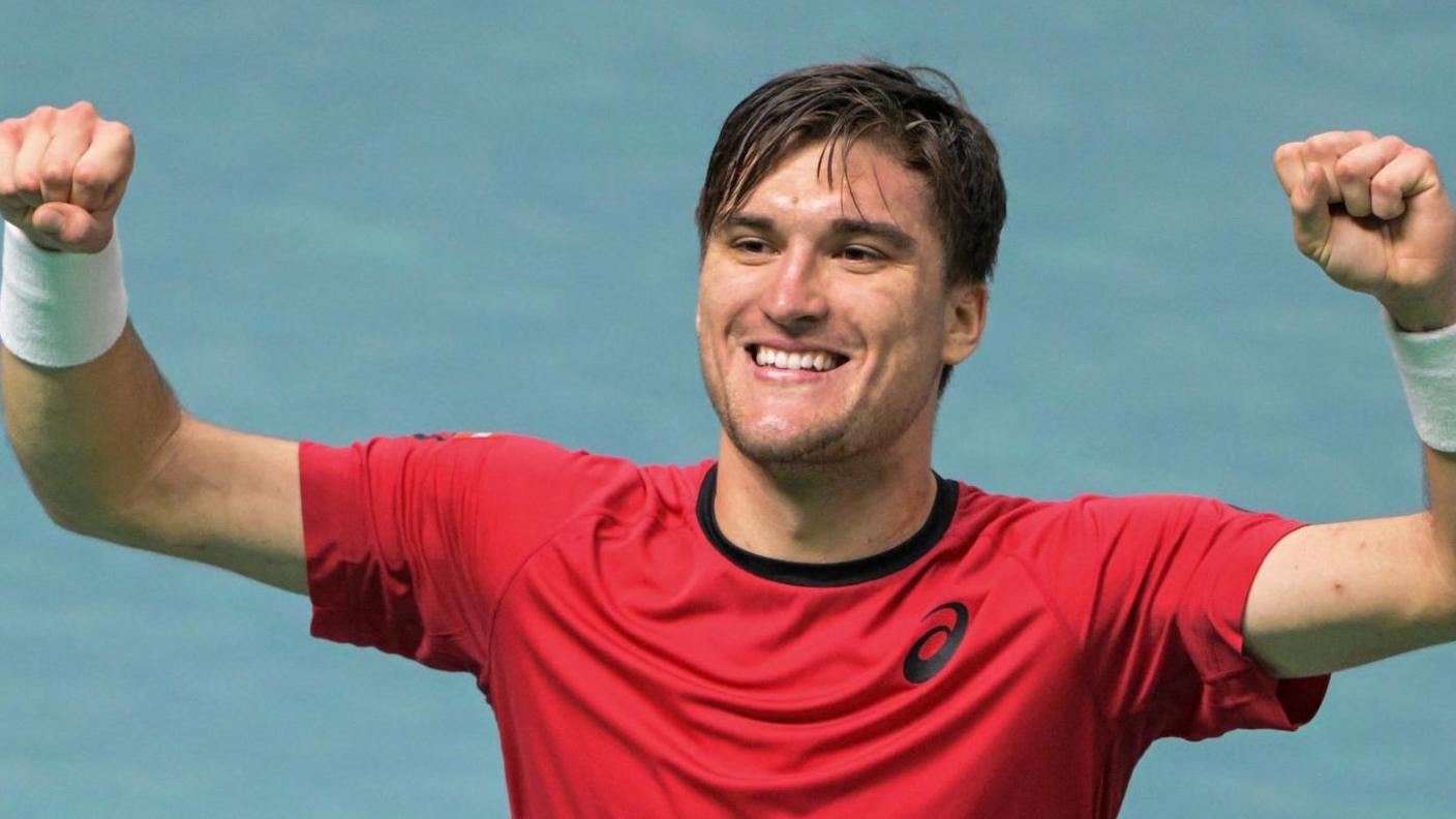 Raphael Collignon celebrates aft giving Belgium nan lead against France