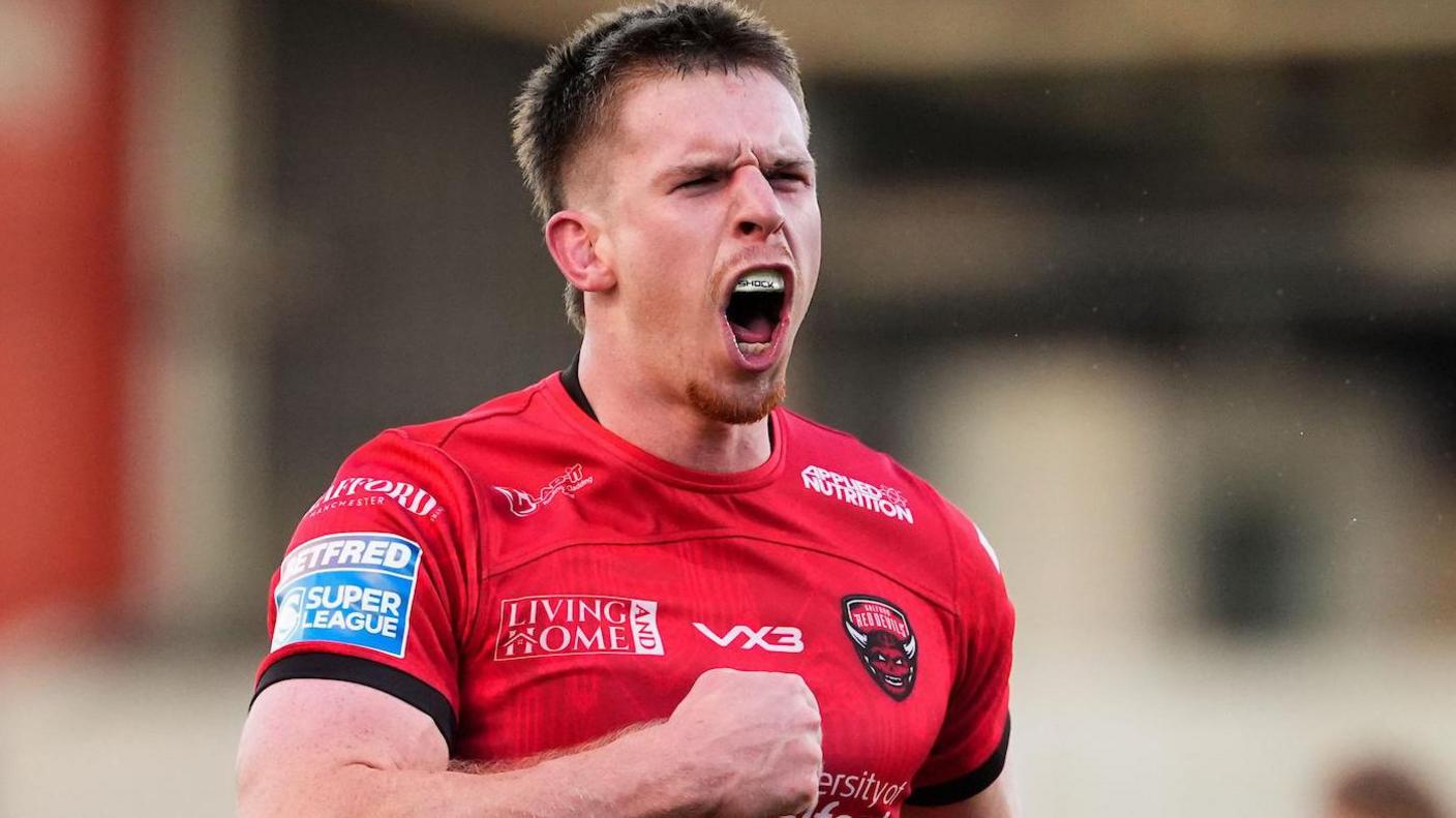 Loghan Lewis in action for Salford Red Devils